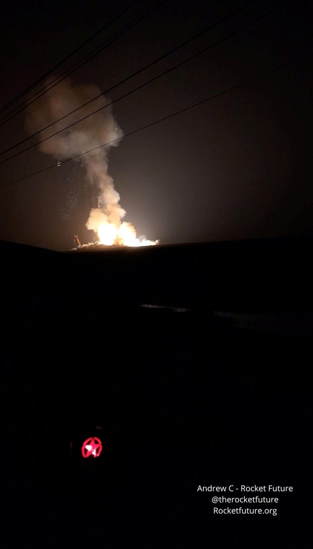 Flames rise as a SpaceX rocket explodes 