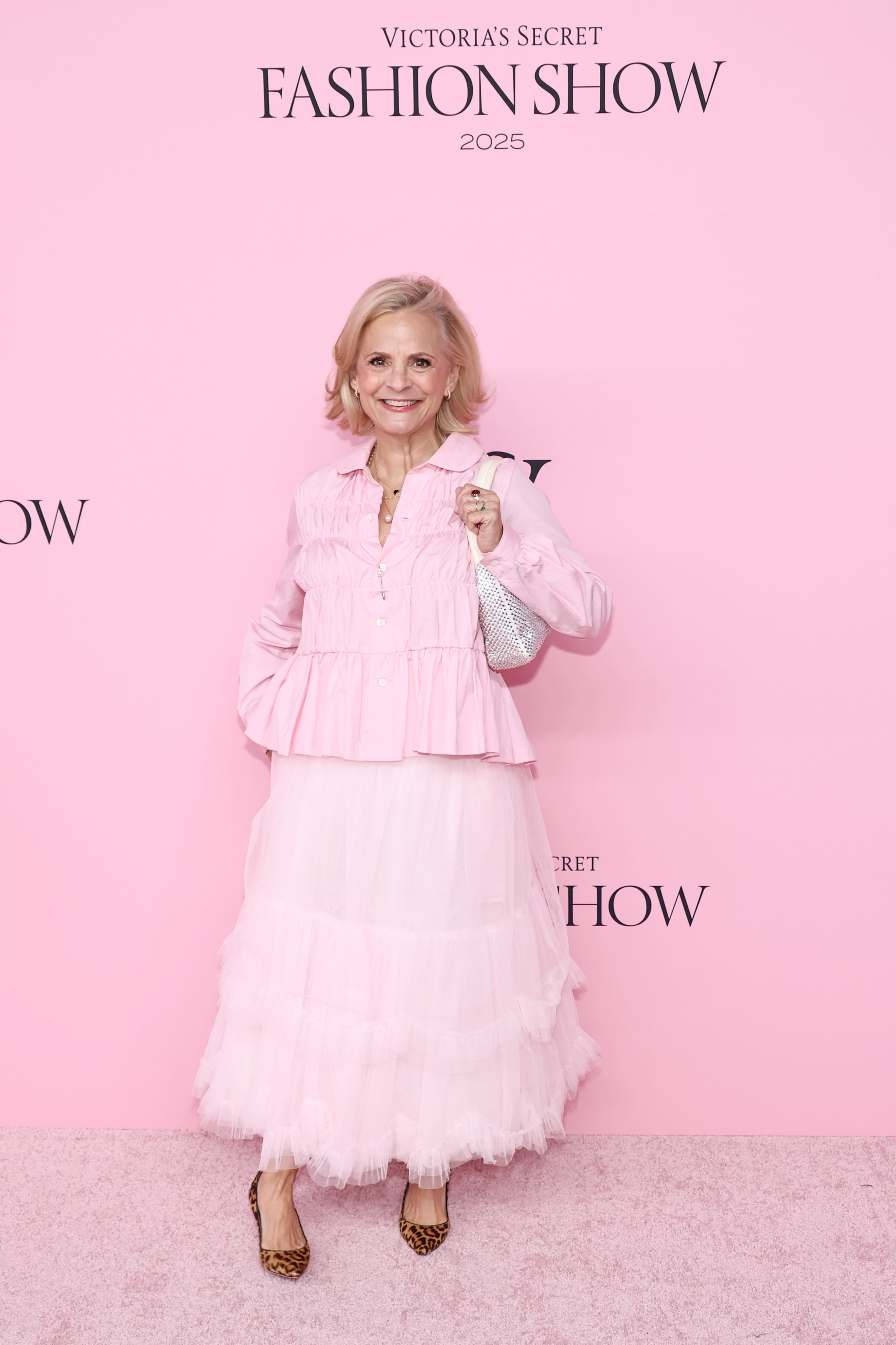 Actress and comedian Amy Sedaris was decked out in the brand's signature color, layering a pale pink frilly skirt with a slightly darker pink jacket and cheetah-print shoes. Her friend, the brand’s Executive Creative Director Adam Selman, told her to wear pink, she revealed on the Pink carpet