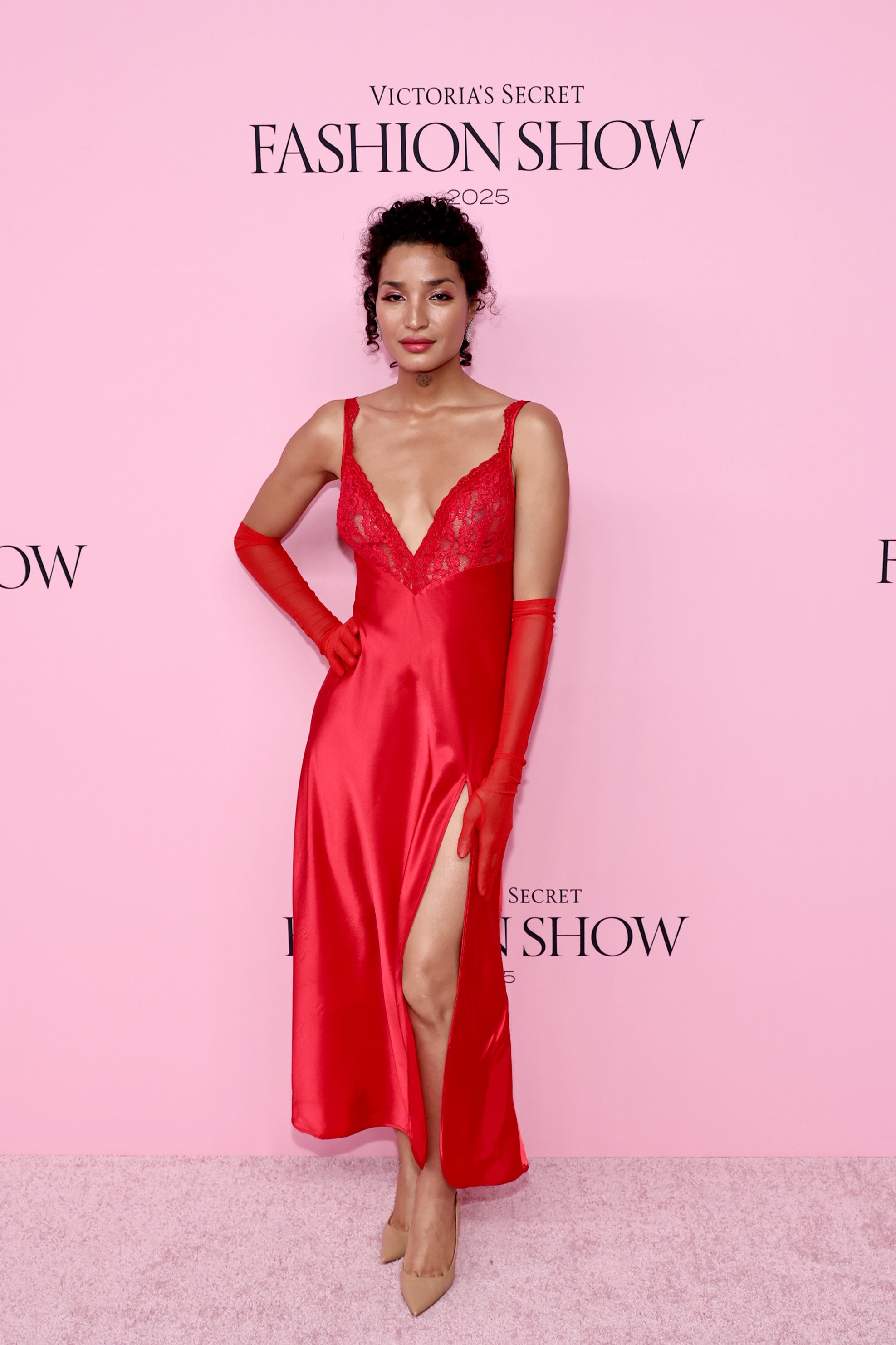 Actor and model Indya Moore went full lingerie for the Pink carpet, completing her all-red look with sheer gloves